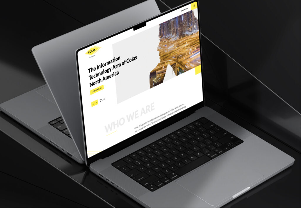 Laptop displaying website homepage on desk