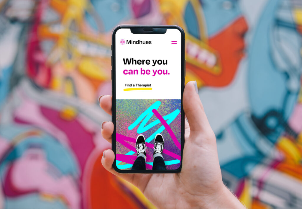 Smartphone displaying mobile app interface with colorful background