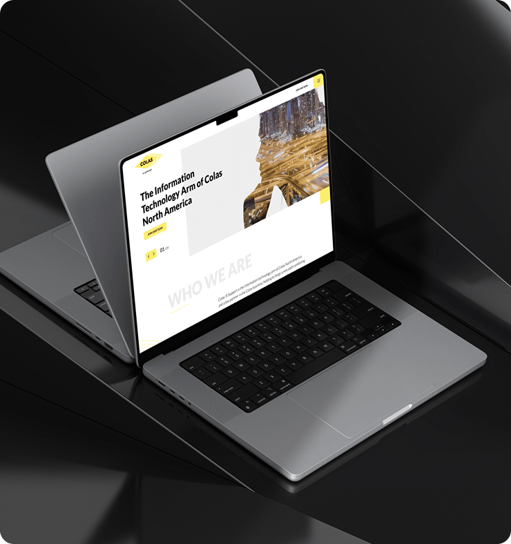Laptop displaying corporate website homepage