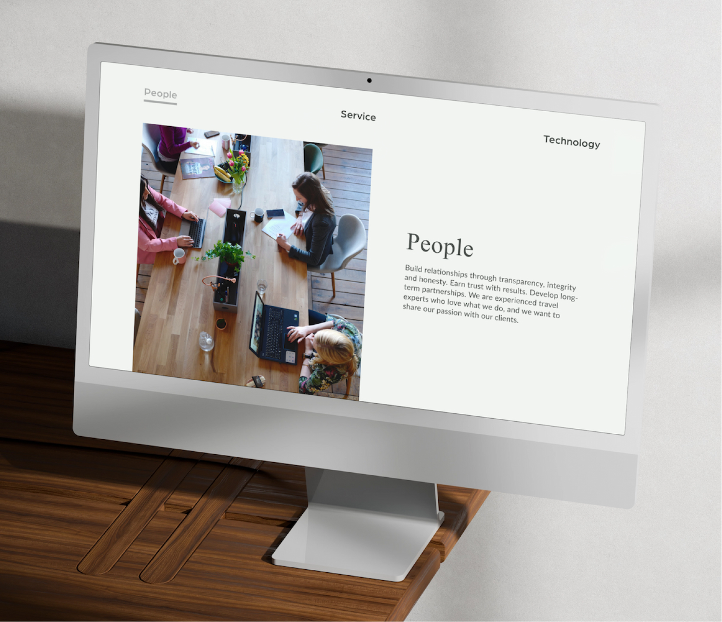 Desktop monitor displaying website homepage design