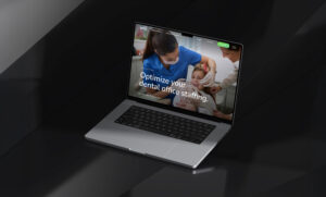 Laptop displaying website homepage in dark setting