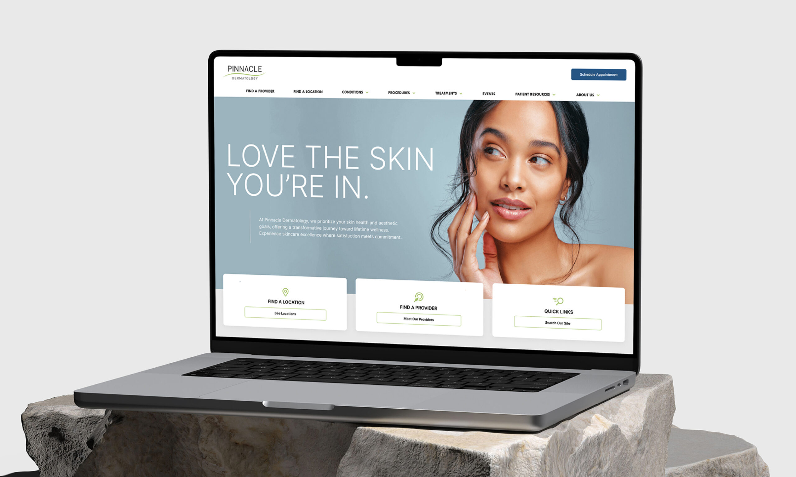 Laptop displaying website with user profile section