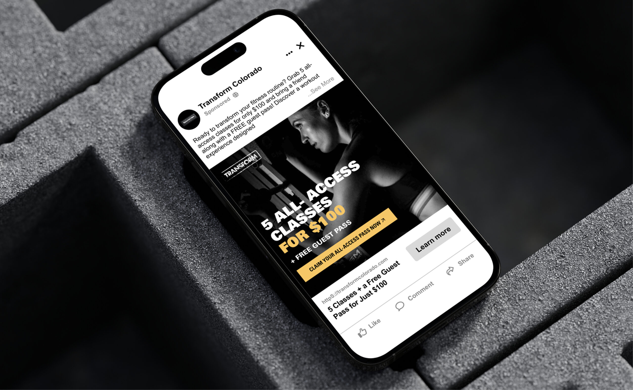 Smartphone displaying ecommerce product page on dark surface