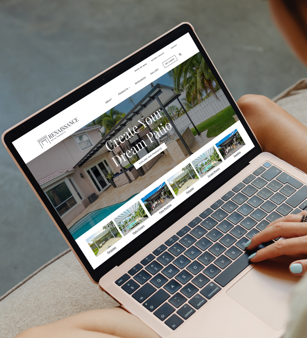 Person using laptop to browse website interface