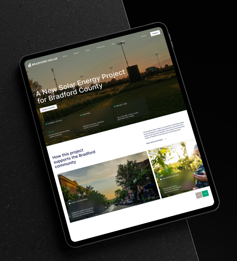 Tablet displaying website homepage with content sections
