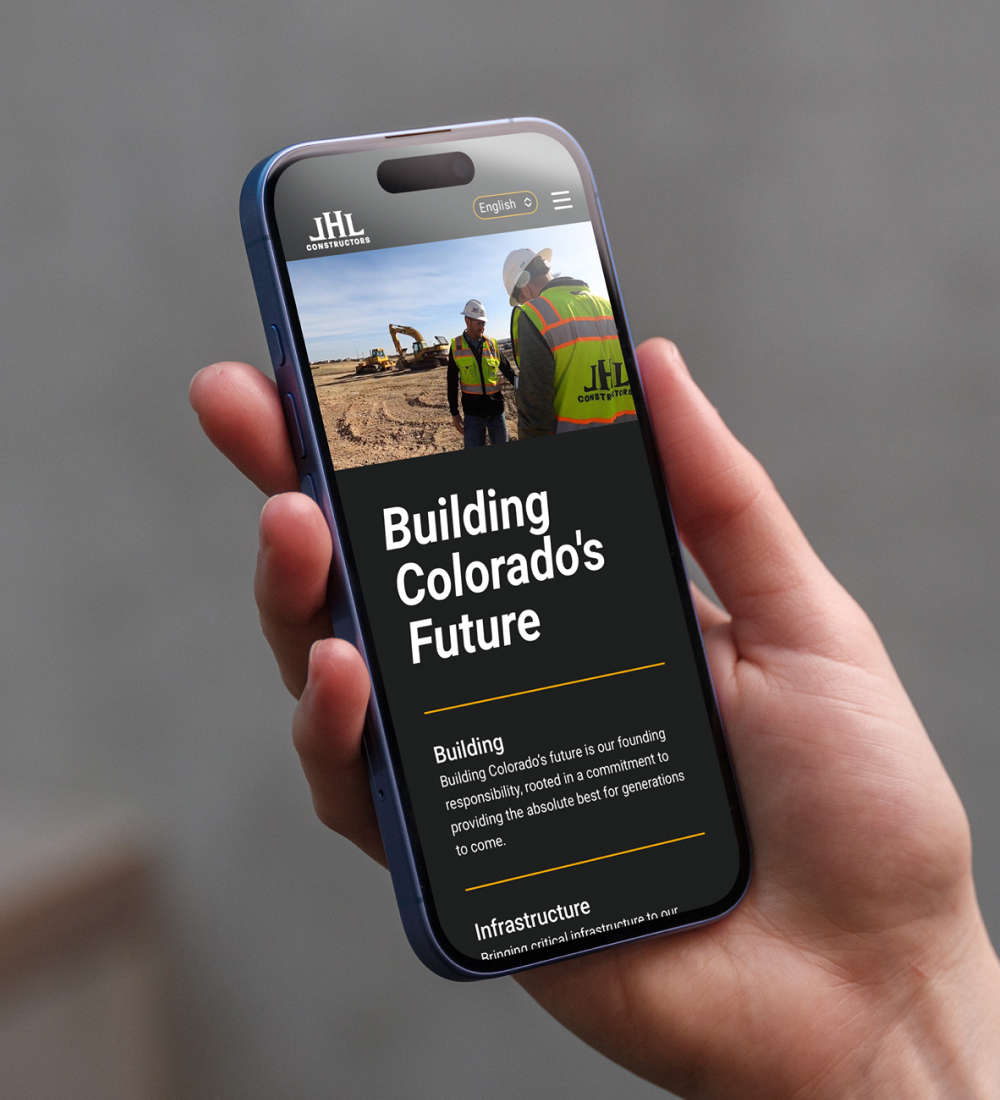 Smartphone displaying website interface in hand
