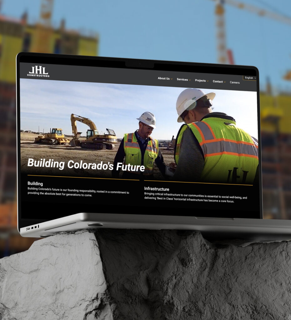 Laptop displaying construction website homepage