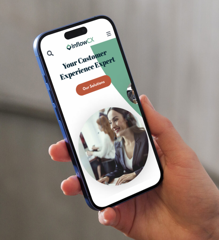 Smartphone displaying mobile app interface in hand