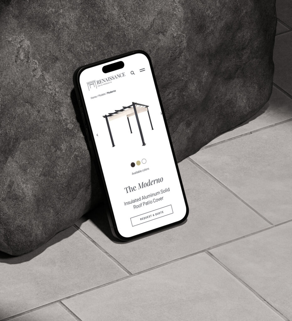 Smartphone displaying mobile website interface in hand
