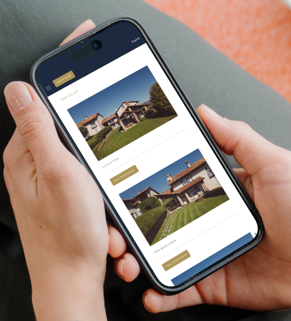 Smartphone displaying mobile website interface in hand