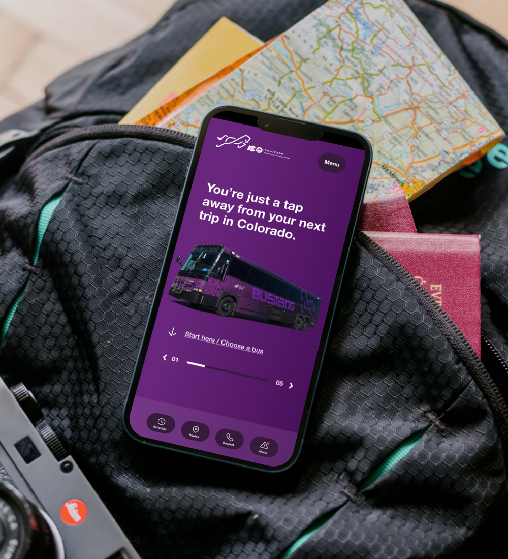 Laptop displaying website homepage on desk