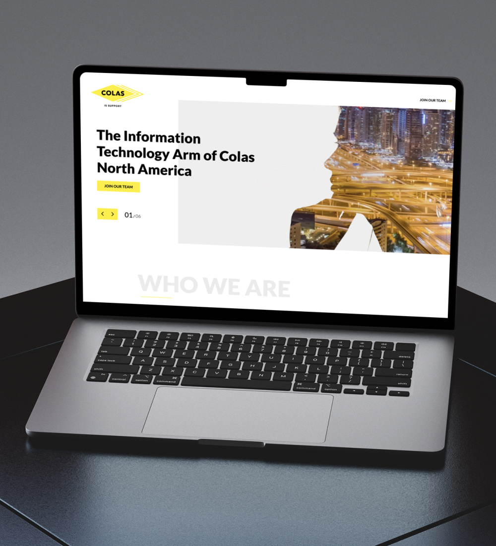 Laptop displaying corporate website homepage