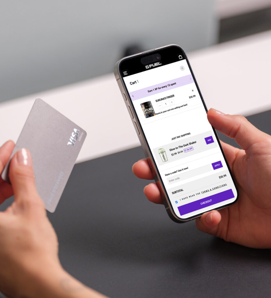 Person holding smartphone using ecommerce app