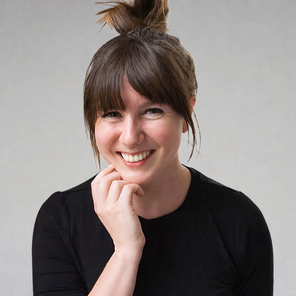 Professional headshot of female team member smiling