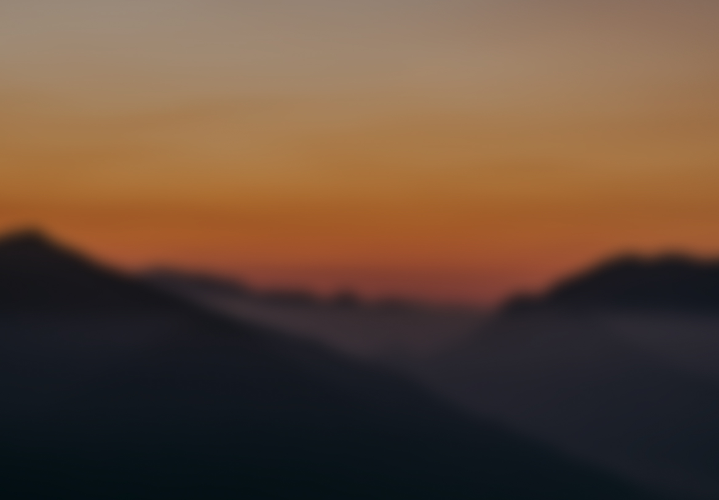 Mountain landscape at sunset with warm tones