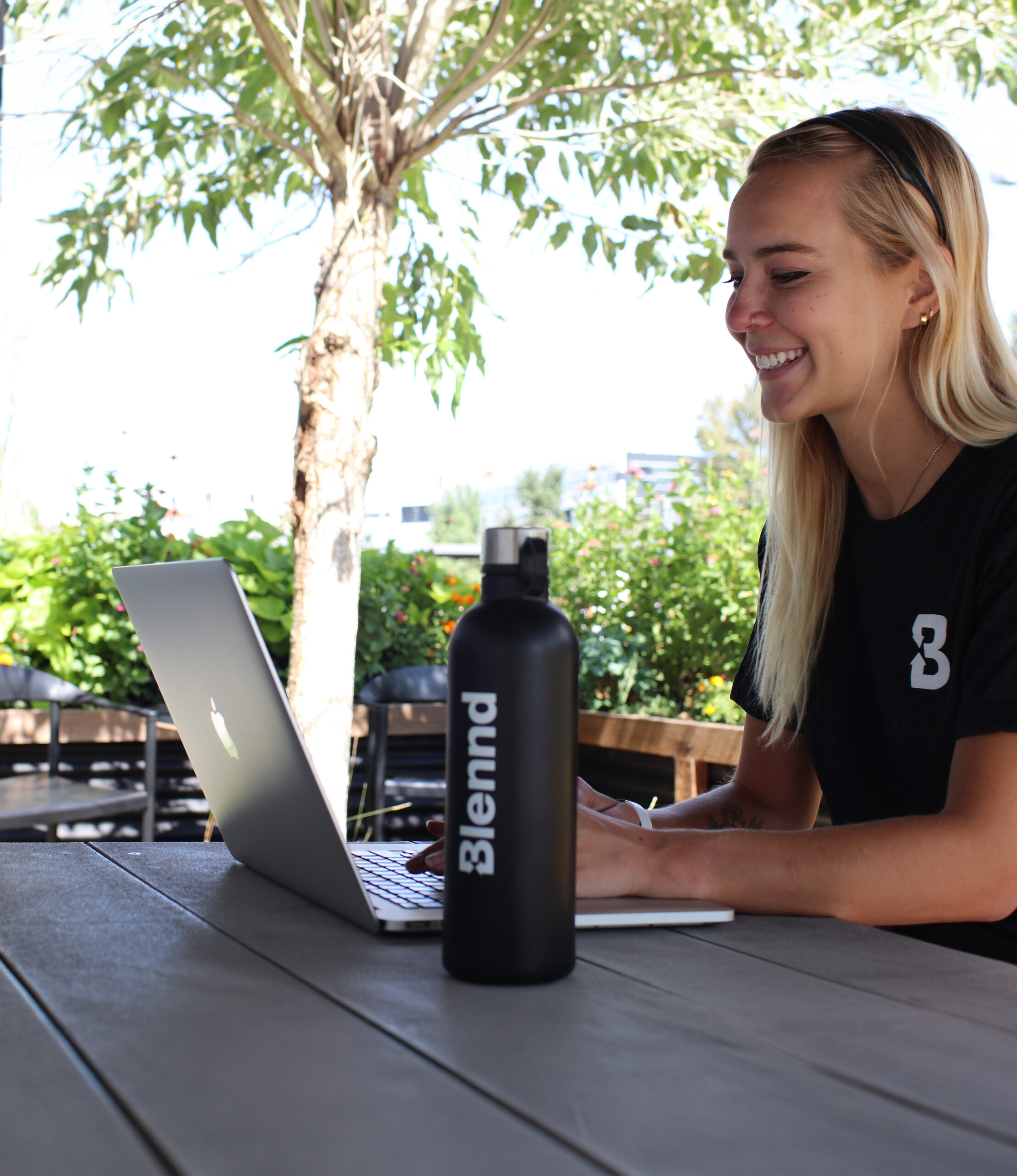 Blennd team members collaborating at outdoor workspace