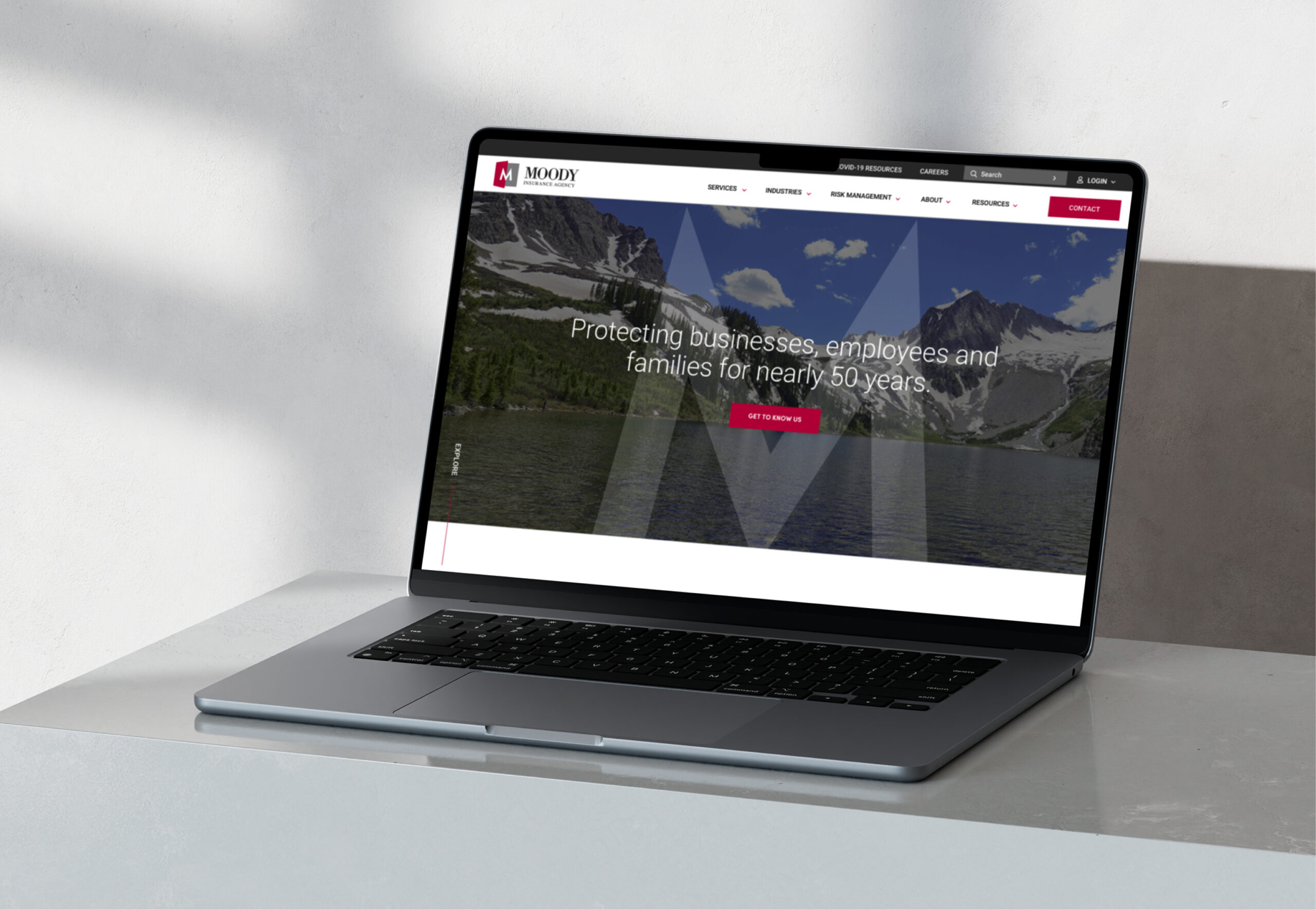 Website design displayed on laptop screen