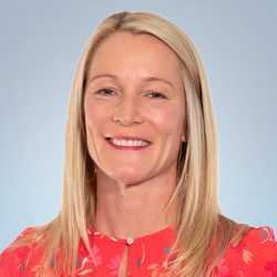 Professional headshot of female business professional smiling